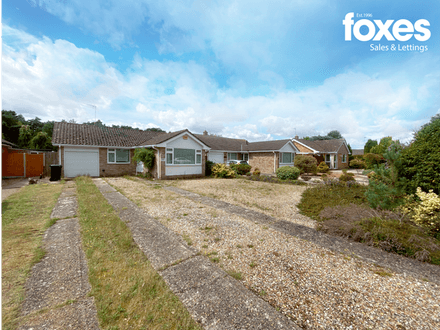A two bedroom detached bungalow with south facing garden and garage